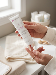 Mum squeezing Silverette Zinc Cream onto her hand before a nappy change